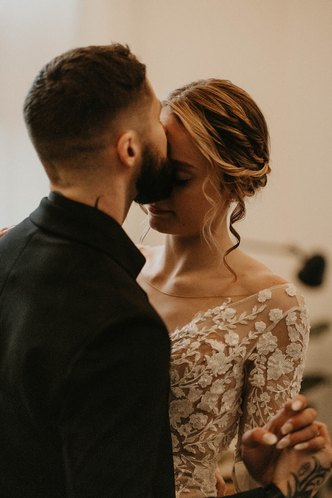 Bride and groom first dance at cozy cabin in Mount Rainier