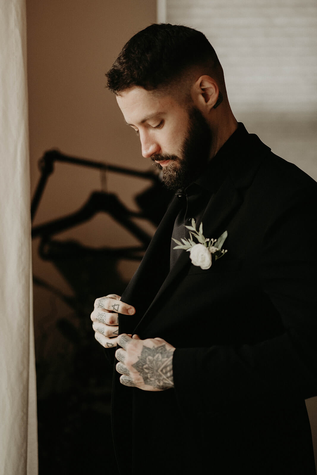 Groom getting ready for mount rainier wedding