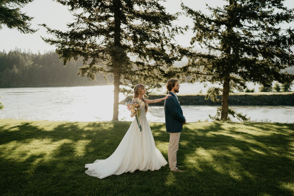 Bride and groom first look on Thunder Island, Oregon