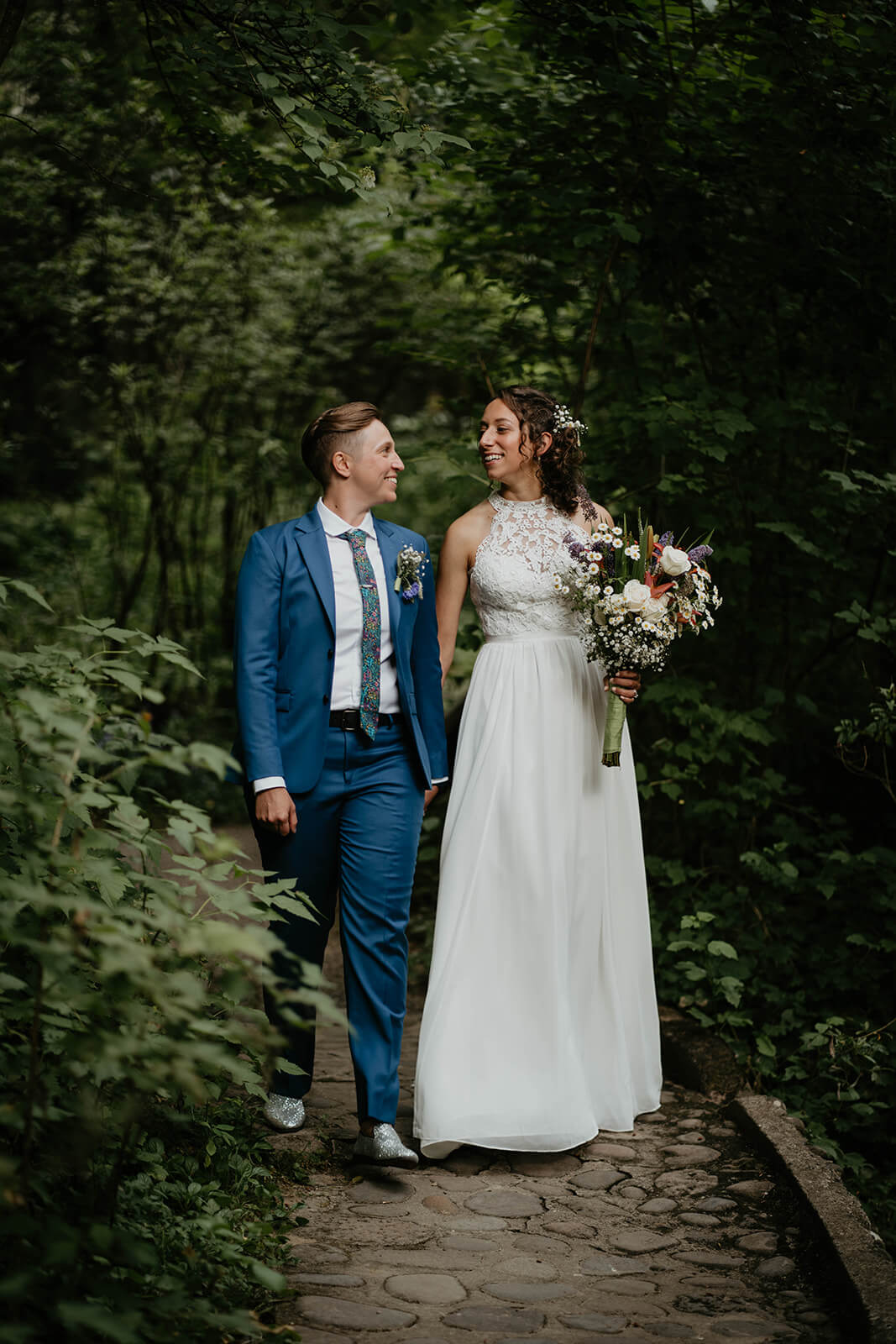 Wedding portraits in the forest with two brides