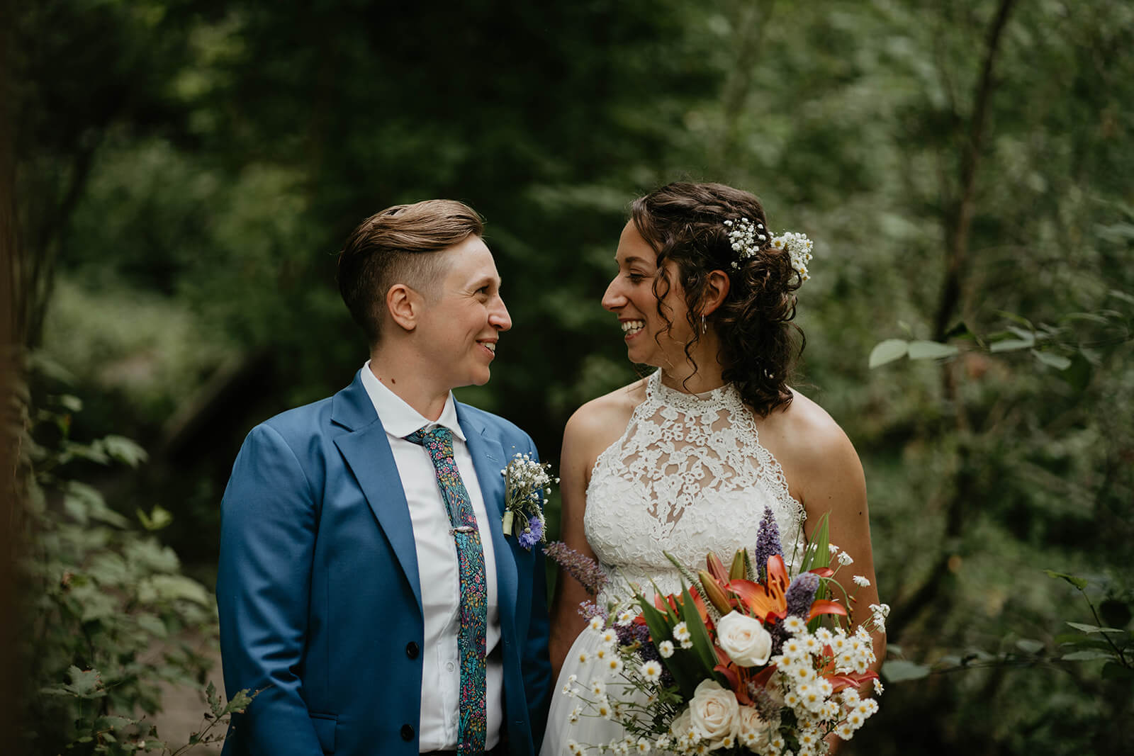 Wedding portraits in the forest with two brides