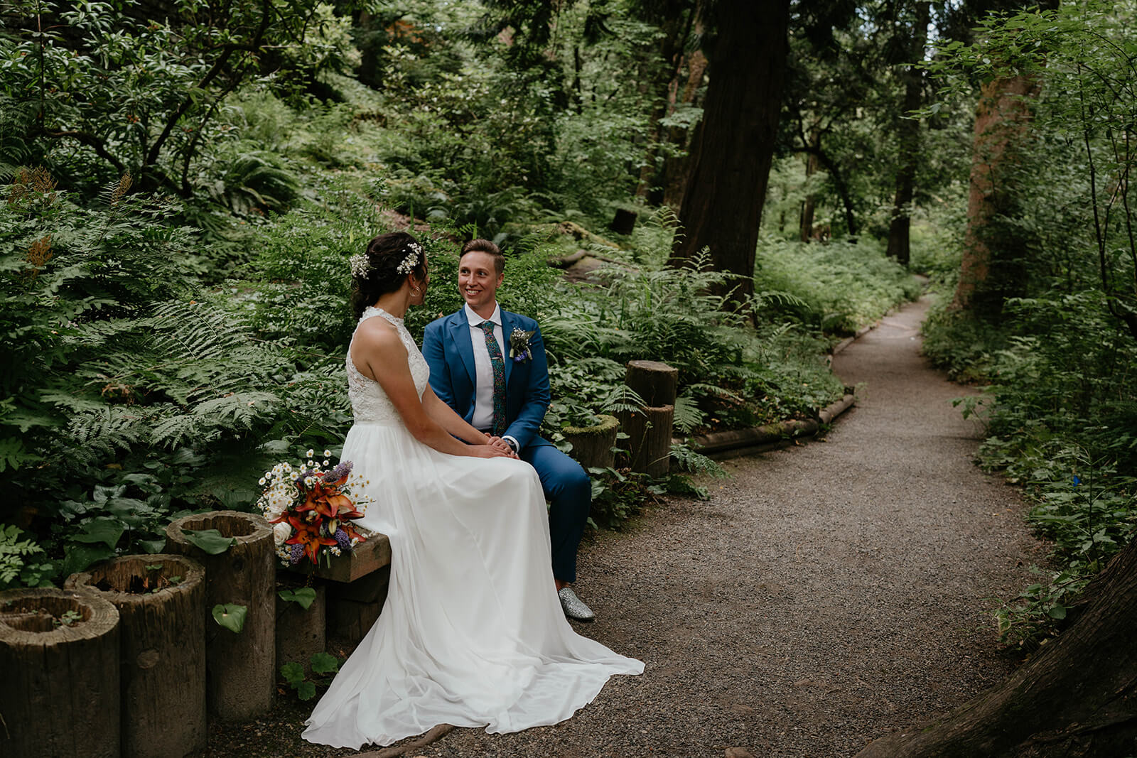 Wedding portraits in the forest with two brides