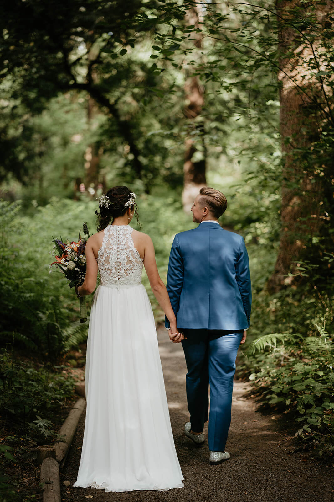 Wedding portraits in the forest with two brides