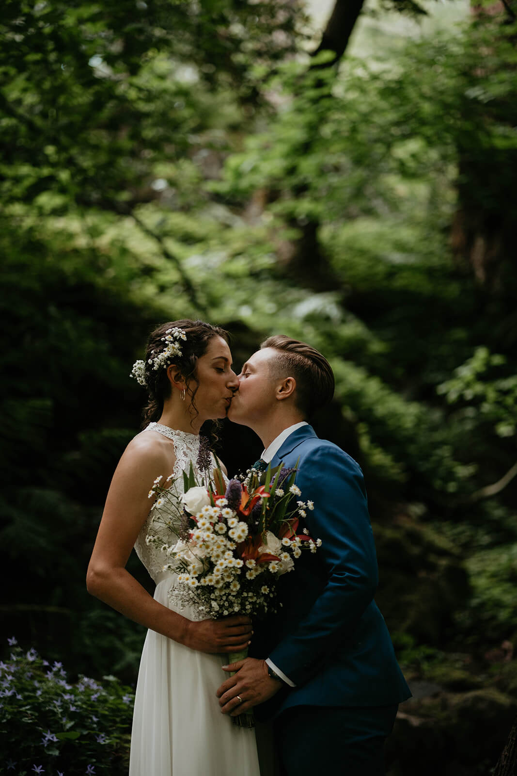 Wedding portraits in the forest with two brides