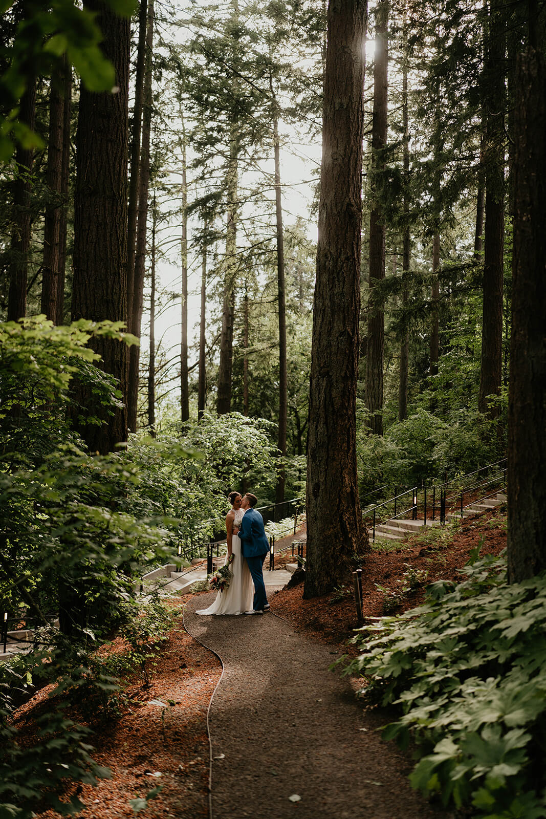 Wedding portraits in the forest with two brides