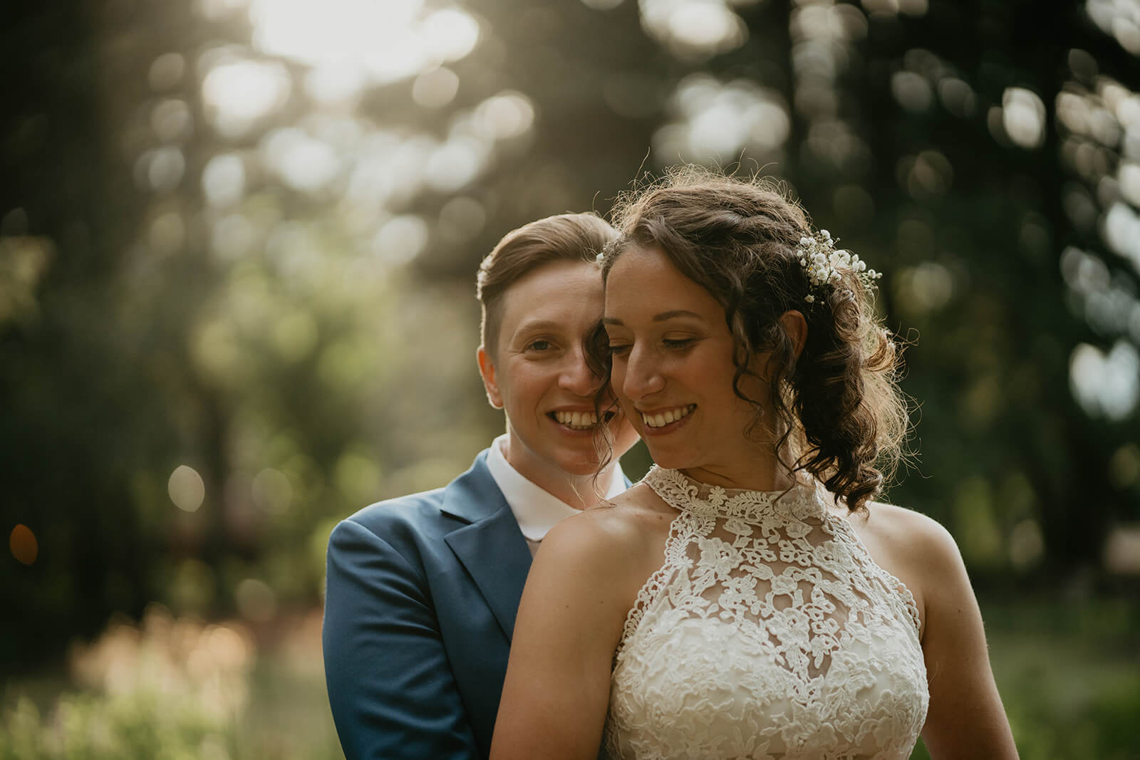 Wedding portraits in the forest with two brides