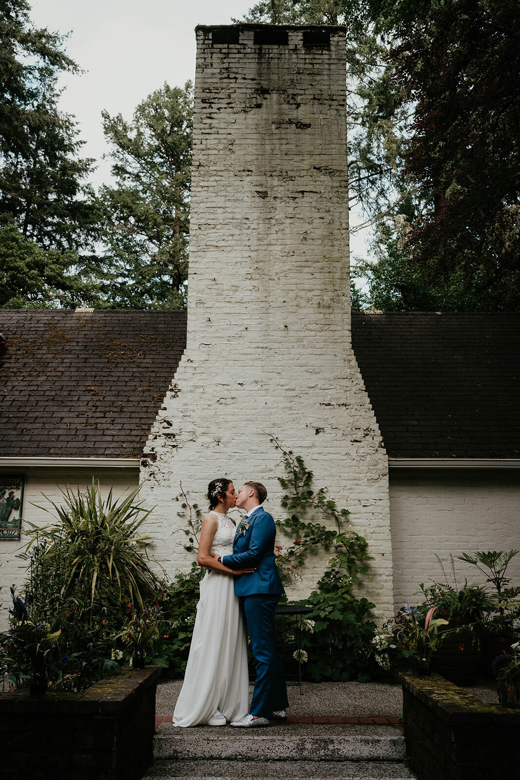 Wedding portraits with two brides at Leach Botanical Garden wedding venue