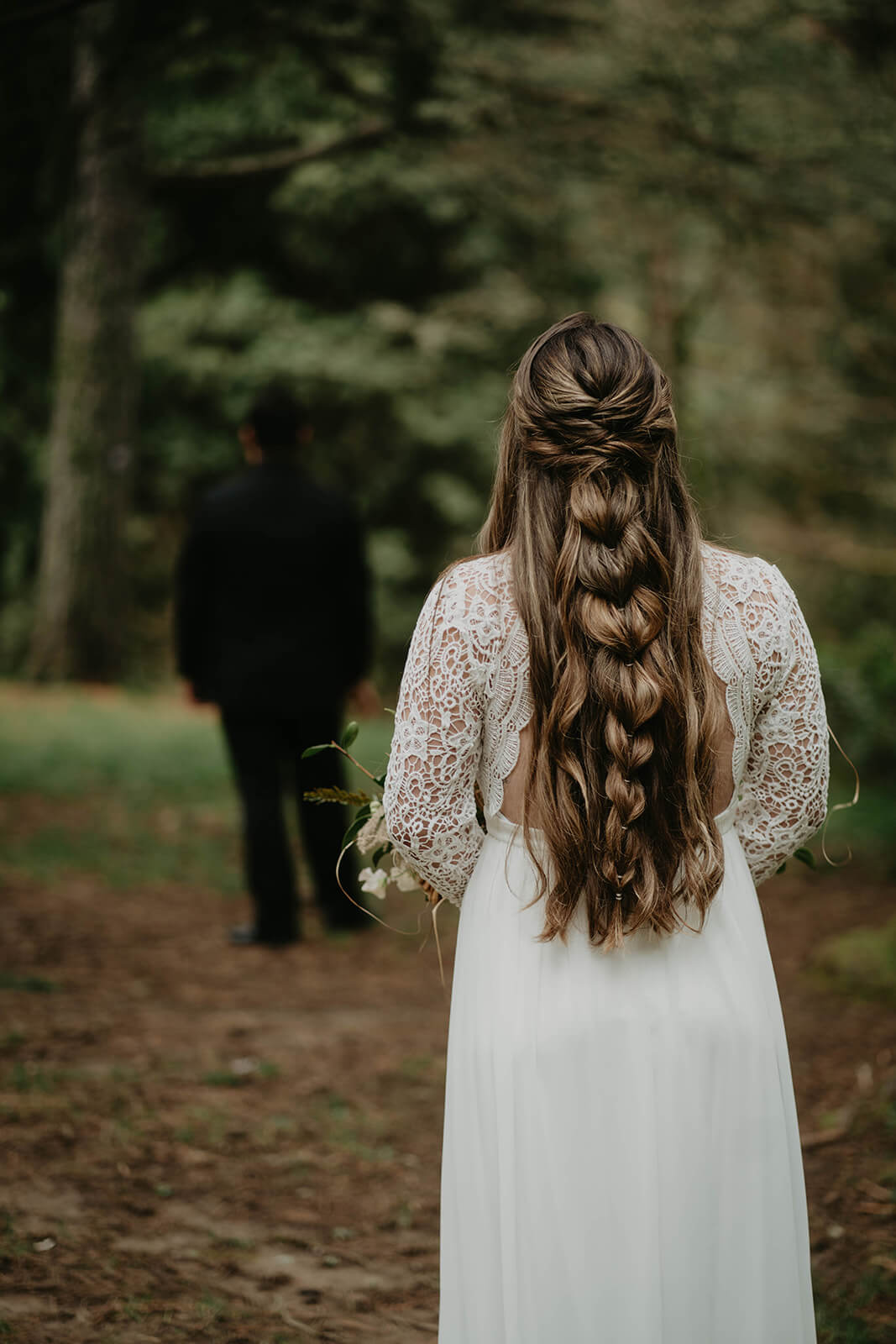 Bride and groom first look in the forest at Hoyt Arboretum