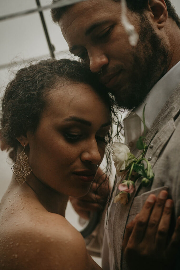 Bride and groom portraits in the rain on the Oregon coast