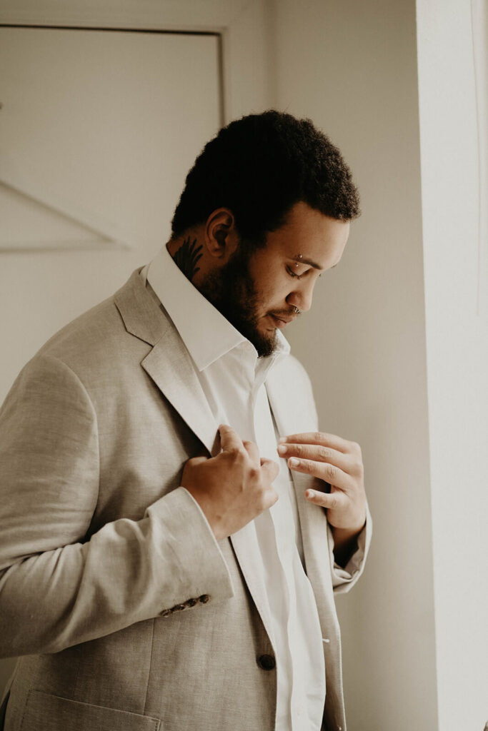 Groom getting ready for Oregon elopement