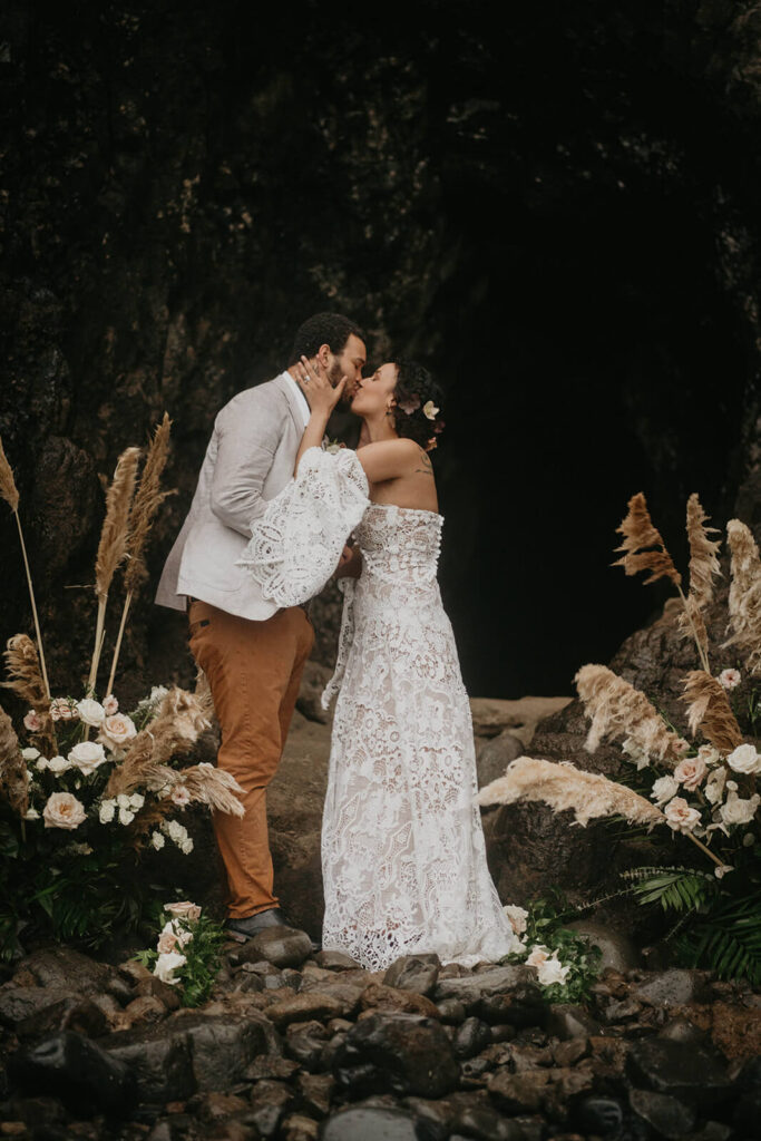 Bride and groom kiss during Oregon elopement on the coast