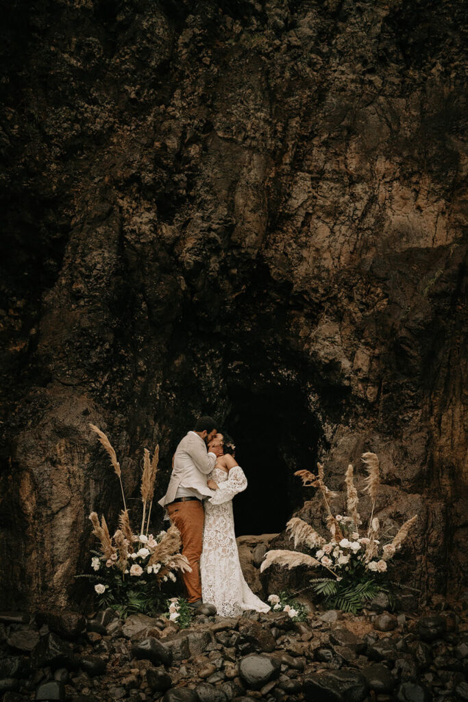 Bride and groom kiss during Oregon elopement on the coast