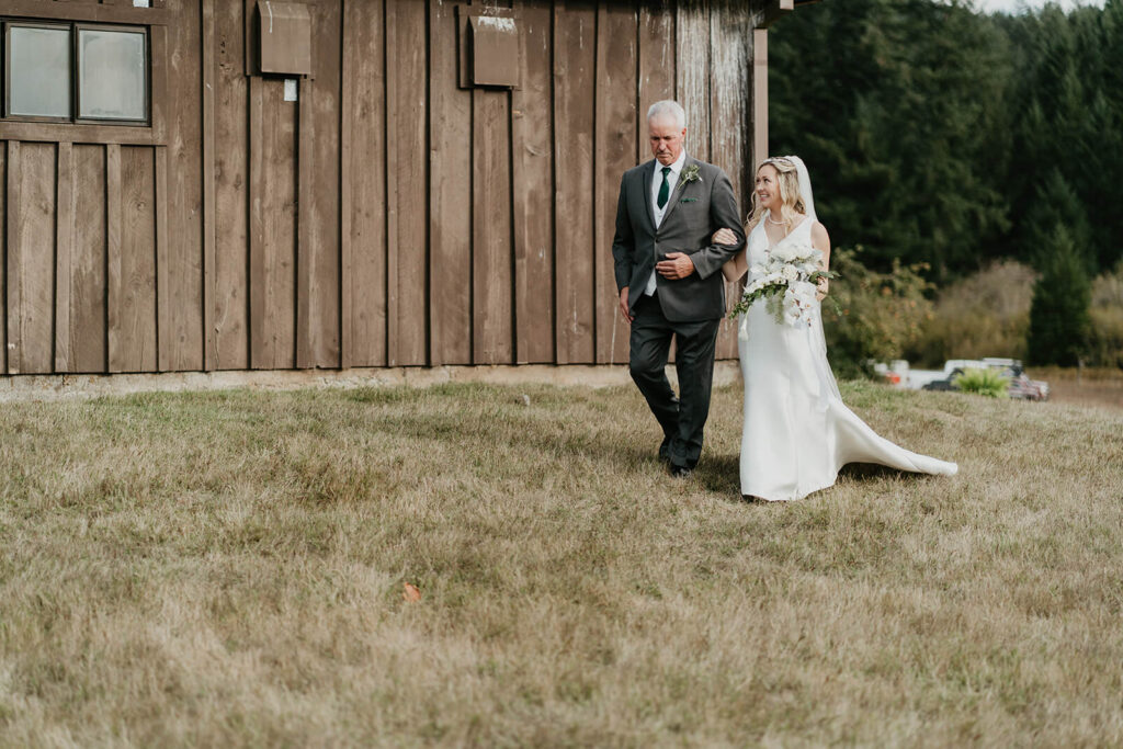 Bride and father walking down the aisle