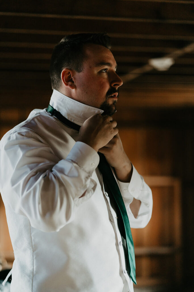 Groom getting ready for Silver Falls wedding