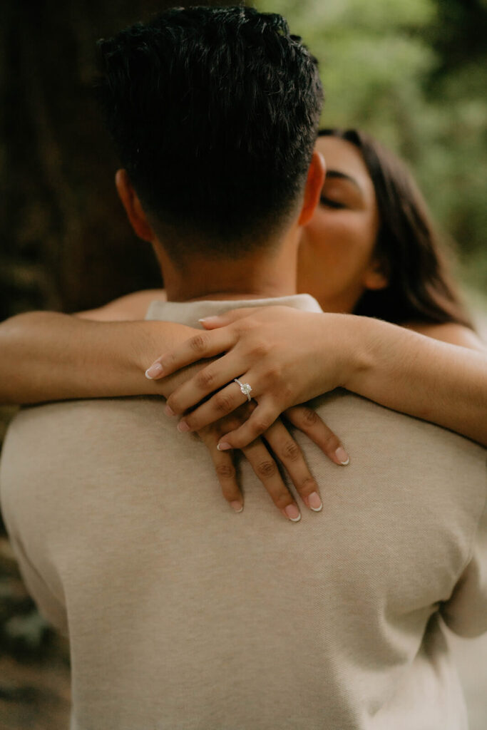 Couple kissing during engagement photos