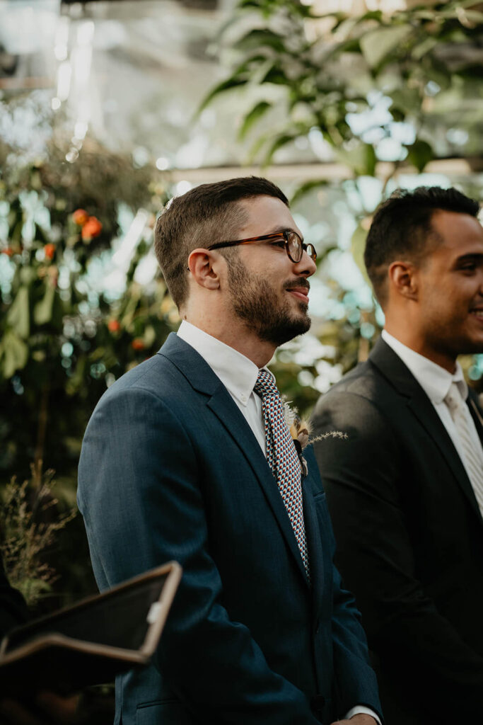 Groom waiting for bride to walk down the aisle at Blockhouse wedding