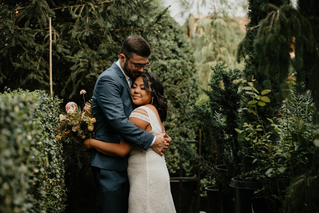 Bride and groom couple portraits during Blockhouse wedding at Pomarius Nursery