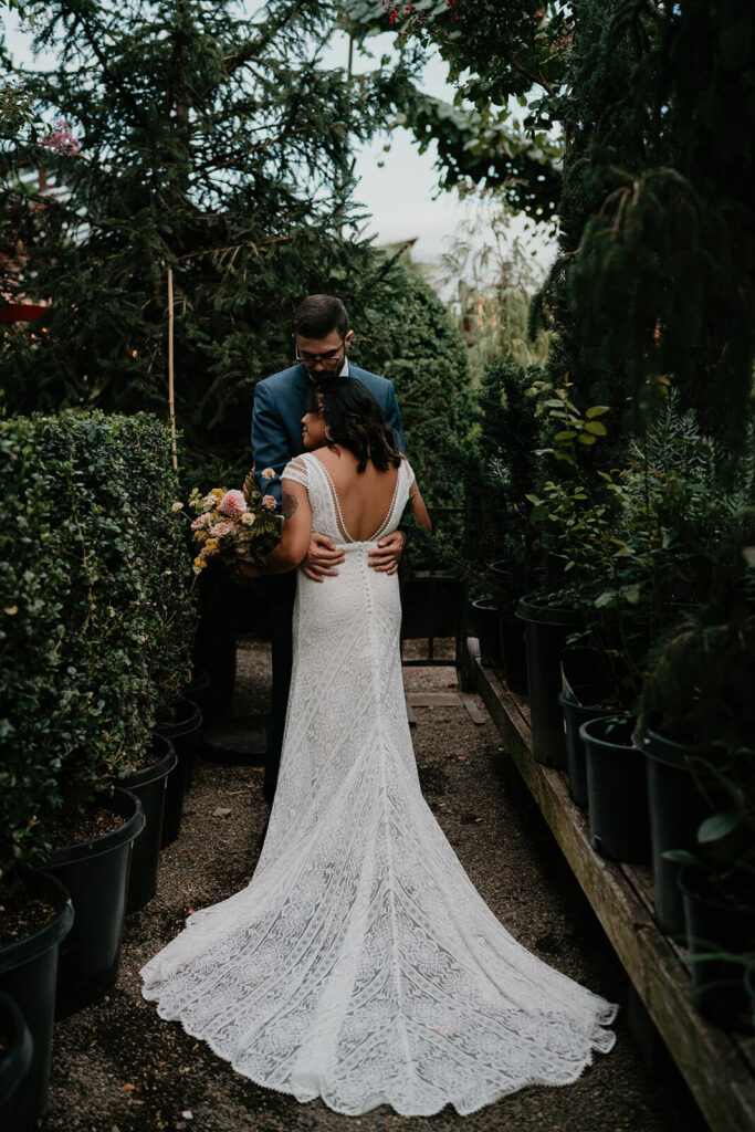 Bride and groom couple portraits during Blockhouse wedding at Pomarius Nursery