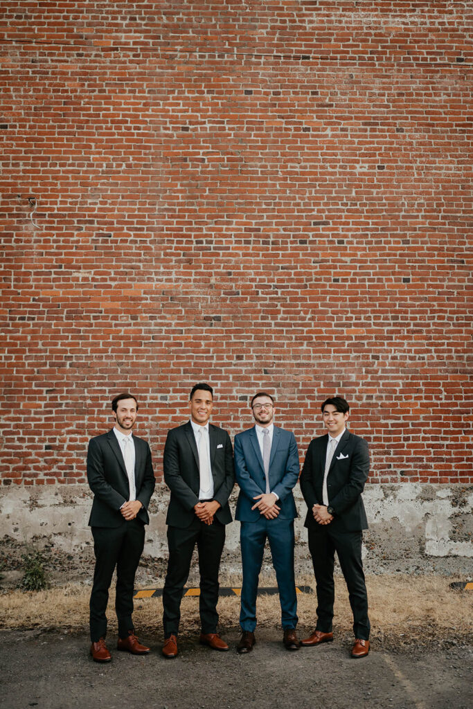 Groom party portraits at Pomarius Nursery