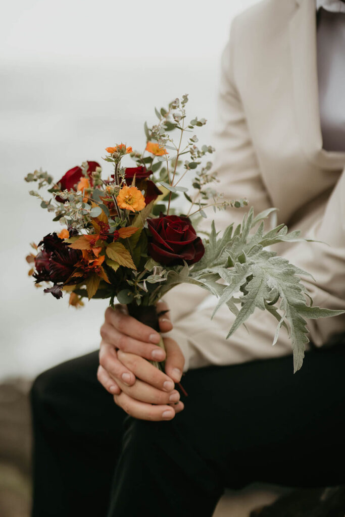 Red, orange and green floral arrangement