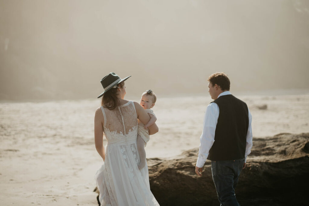 Family portraits during intimate beach wedding on the Oregon Coast