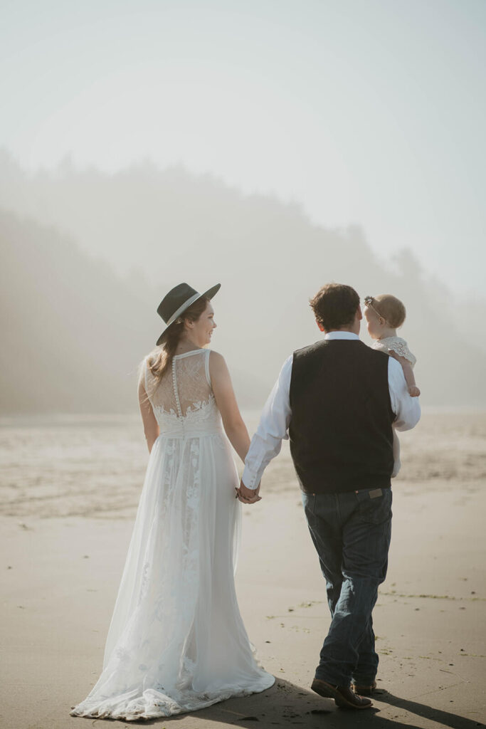 Family portraits during intimate beach wedding on the Oregon Coast