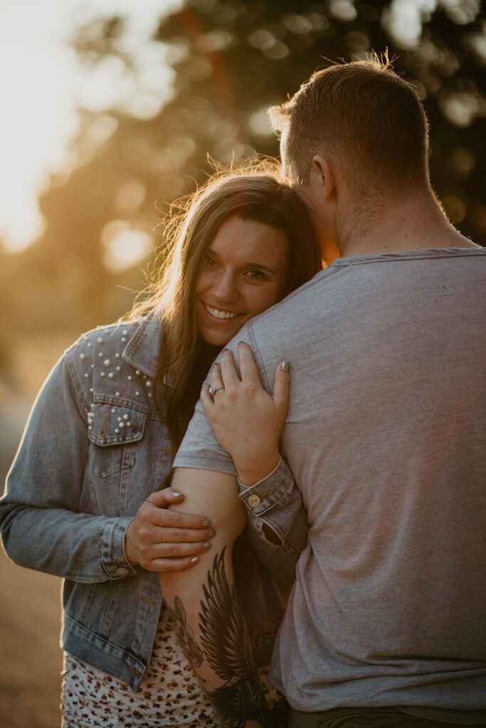 Sunset couple portraits during Seattle engagement photo session at Discovery Park