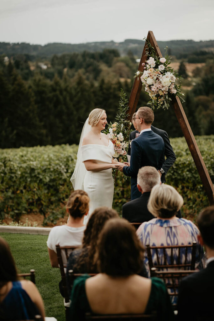 Outdoor wedding ceremony at Ponzi Vineyards