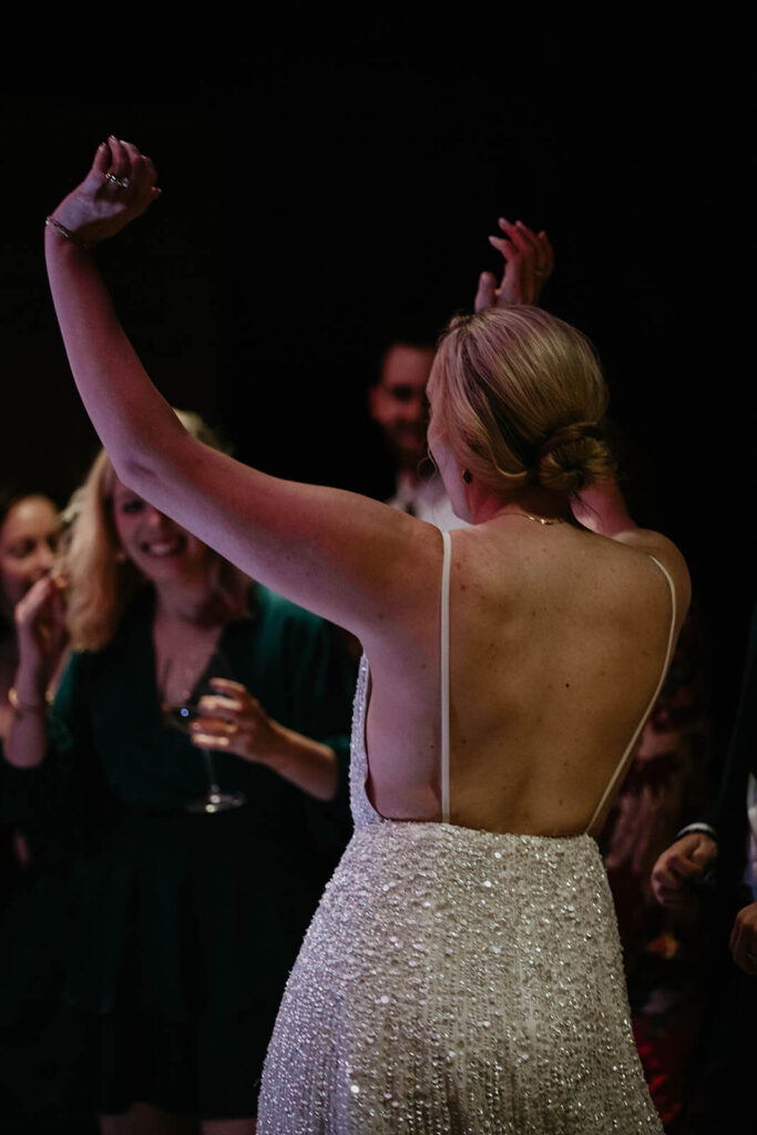 Bride dancing during Oregon vineyard wedding reception