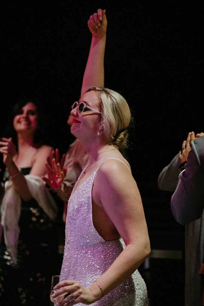 Bride dancing during Oregon vineyard wedding reception