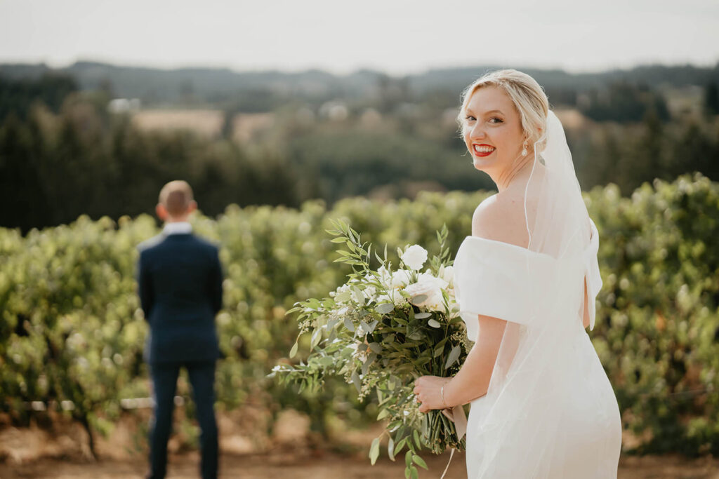 Bride and groom first look at Willamette Valley Vineyards wedding