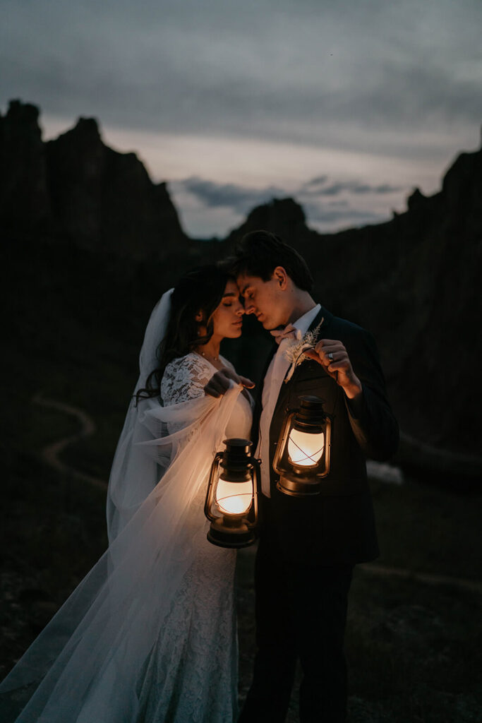 Bride and groom blue hour elopement portraits with lanterns at Smith Rock State Park