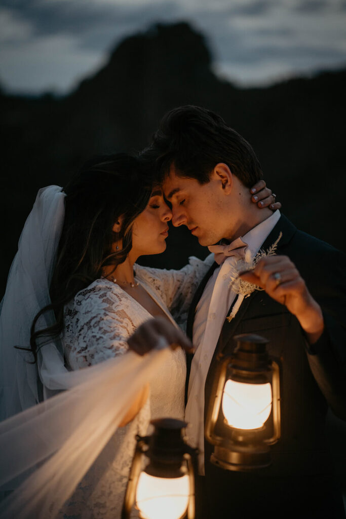 Bride and groom blue hour elopement portraits with lanterns at Smith Rock State Park