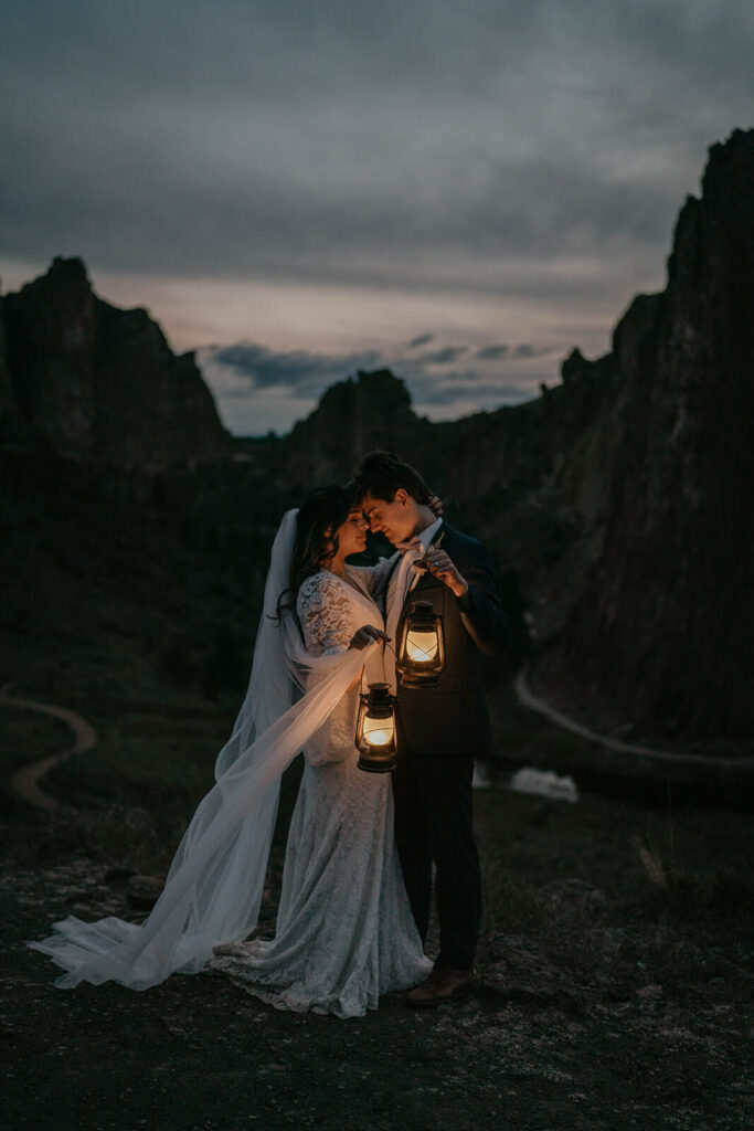 Bride and groom blue hour elopement portraits with lanterns at Smith Rock State Park