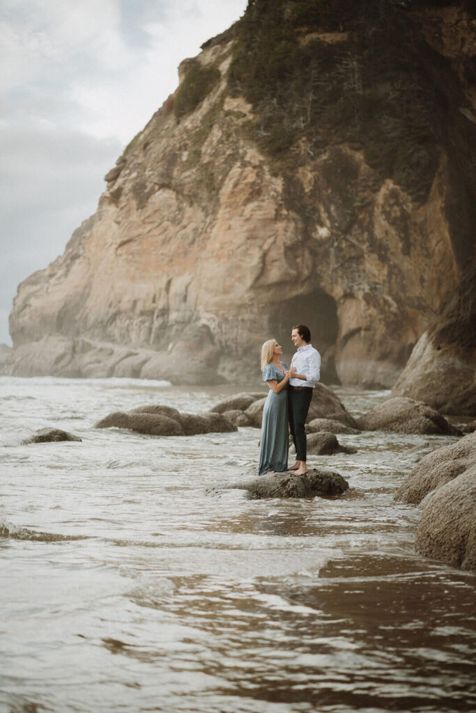 Beach engagement photos at Hug Point