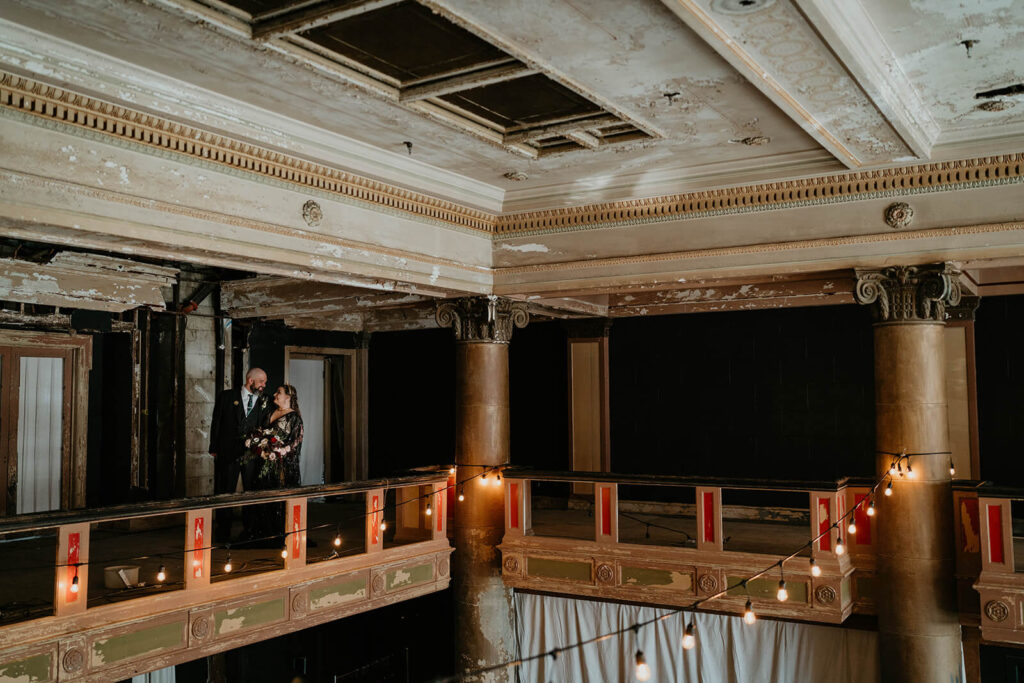 Bride and groom dark wedding portraits at the Ruins at the Astor