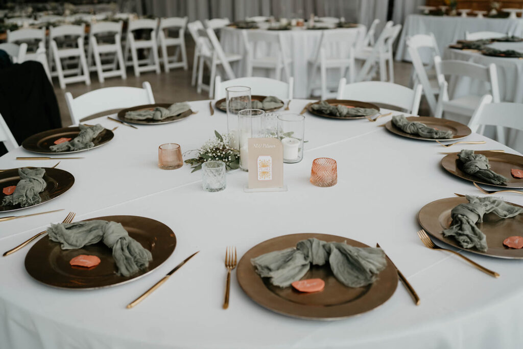 Pink, green and white table setting at romantic wedding in Washington