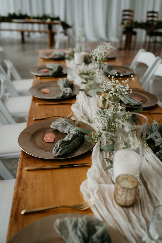 Pink, green and white table setting at romantic wedding in Washington