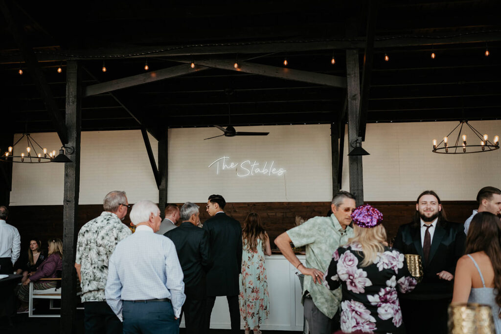 Guests gather at wedding reception at Pemberton Farm