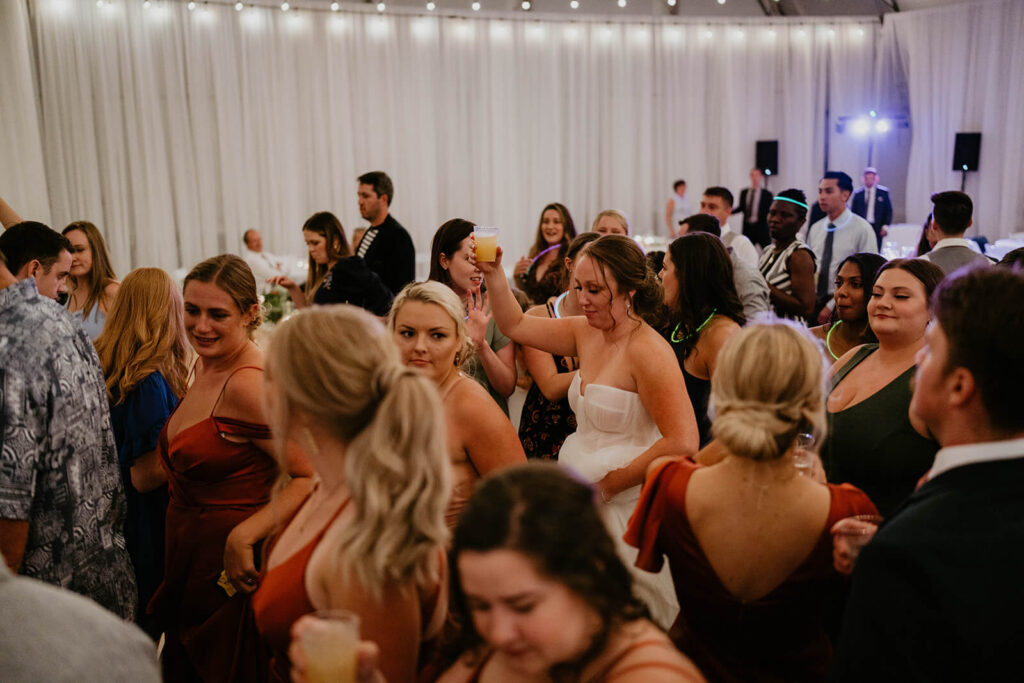 Bride dancing on the dance floor at Pemberton Farm wedding