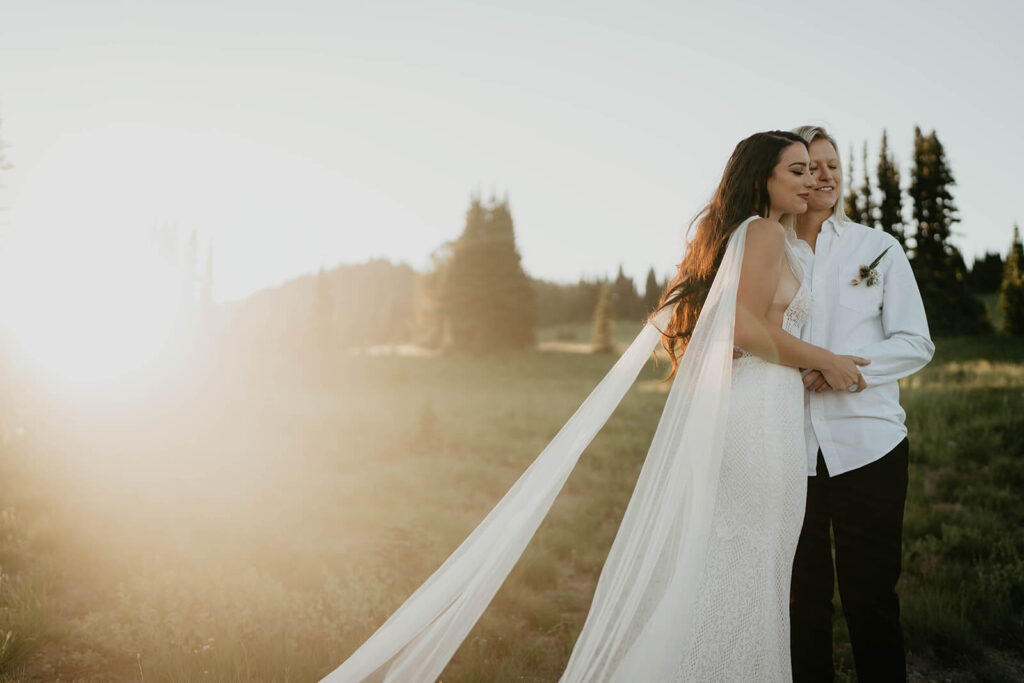 Two brides couple portraits during Sunrise, Mount Rainier elopement