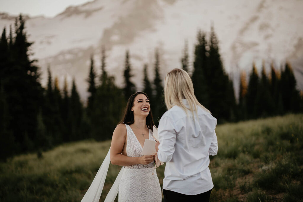 Two brides exchanging vows at Sunrise, Mount Rainier