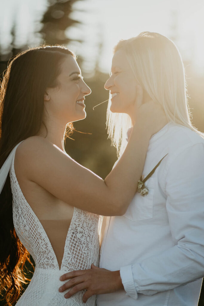 Two brides couple portraits during Sunrise, Mount Rainier elopement