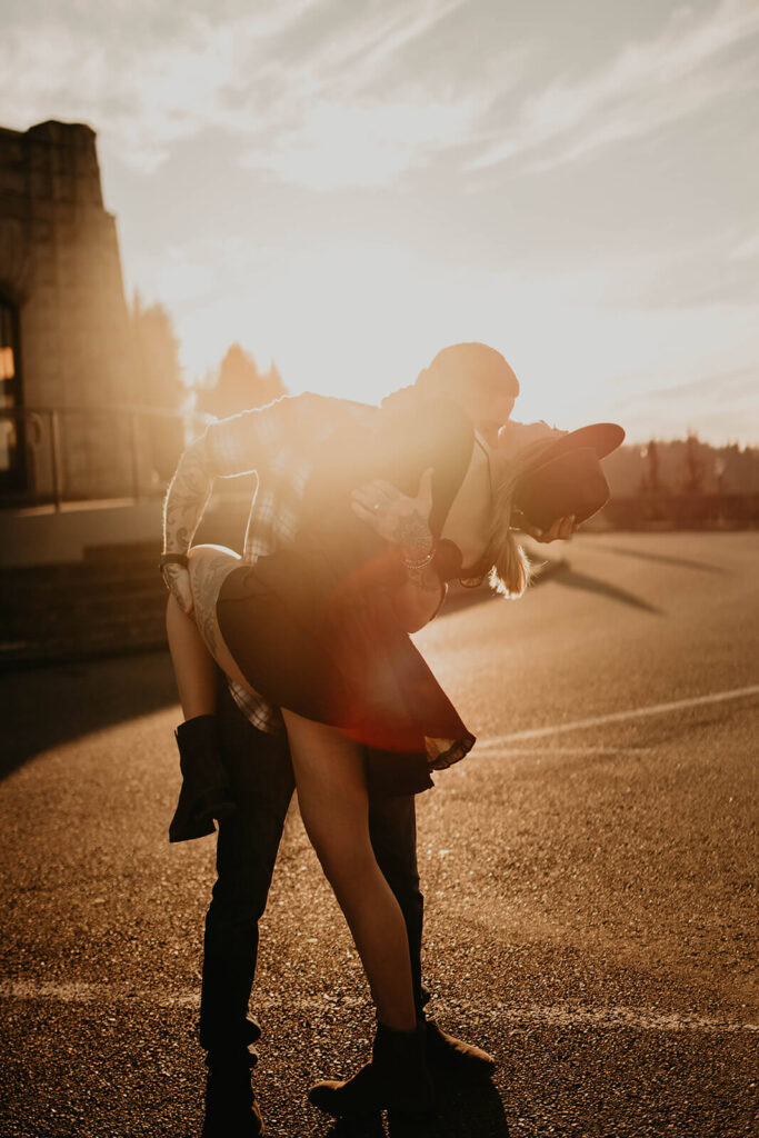 Couple kissing during engagement photoshoot in Portland