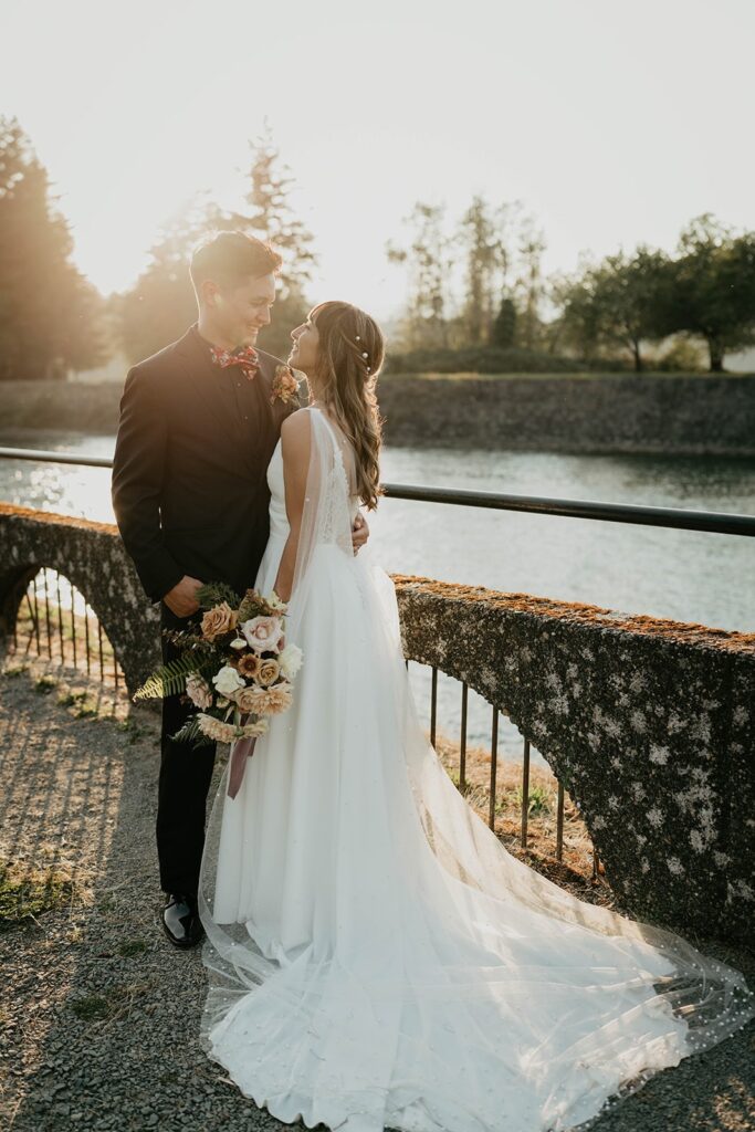 Bride and groom wedding portraits by the Columbia River in Oregon