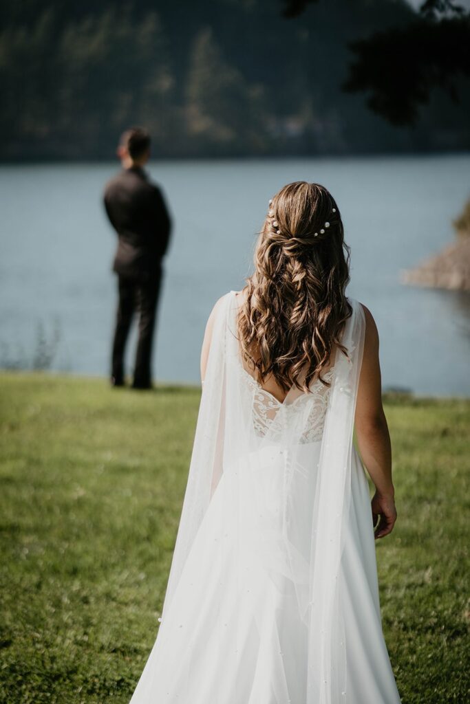 Bride and groom first look at Cascade Locks wedding in Oregon