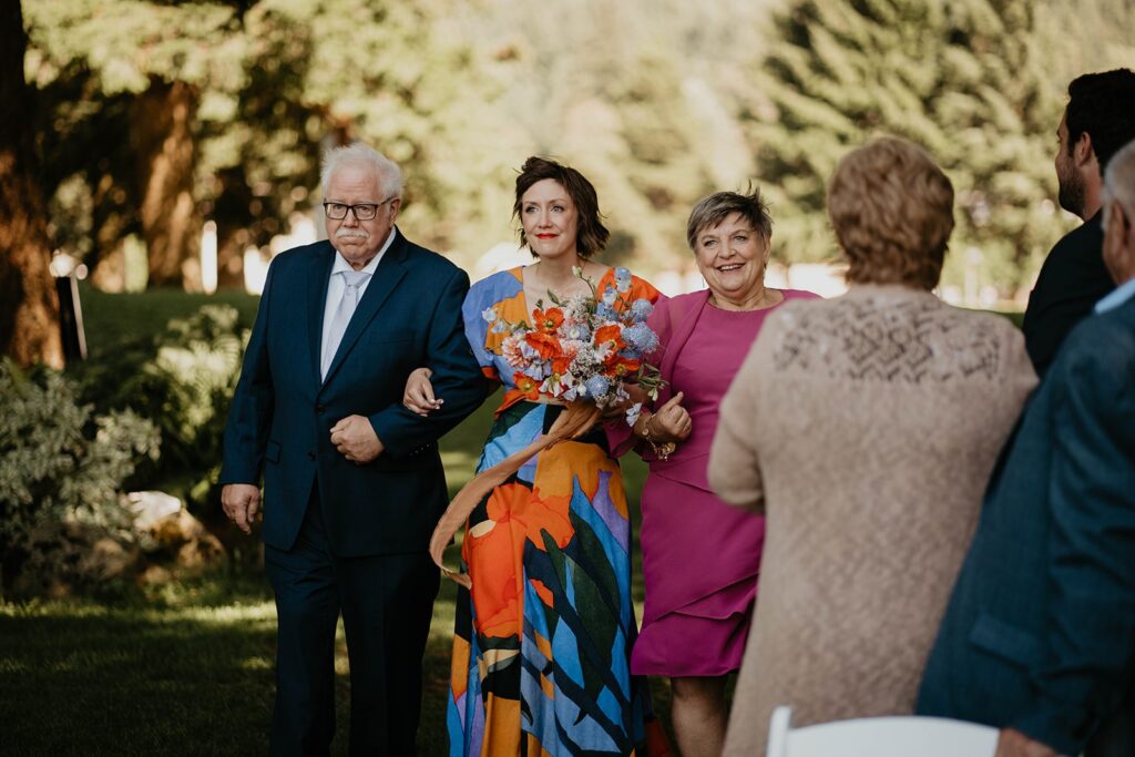 Bride walking down the aisle at Cascade Locks wedding