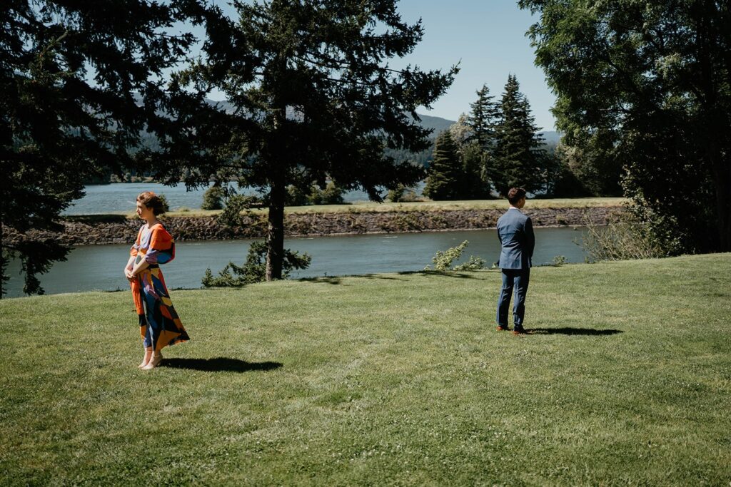 Bride and groom wedding first look at Columbia River Gorge