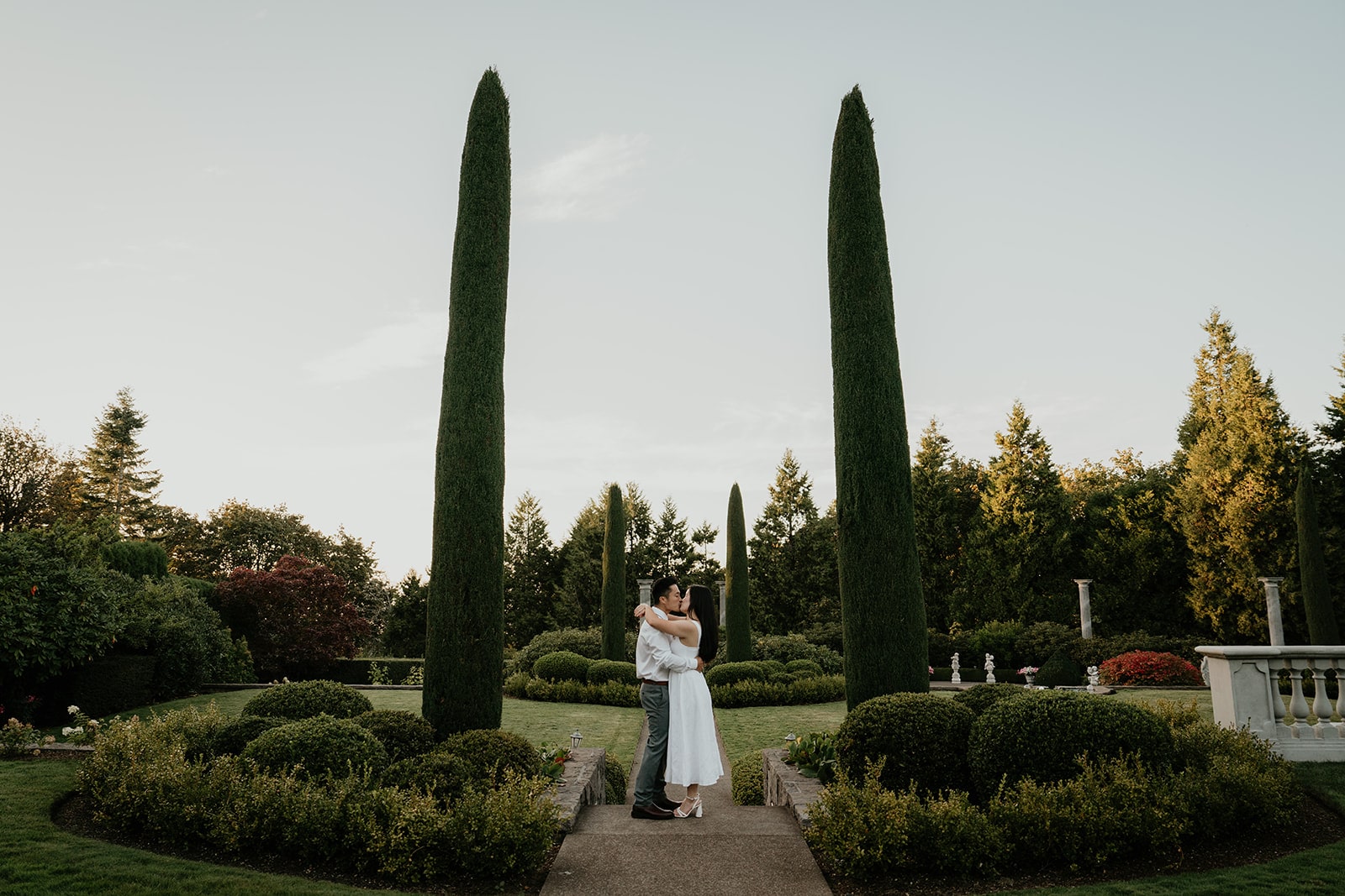 Couple kisses during their Oregon engagement photo session at Chateau de Michellia