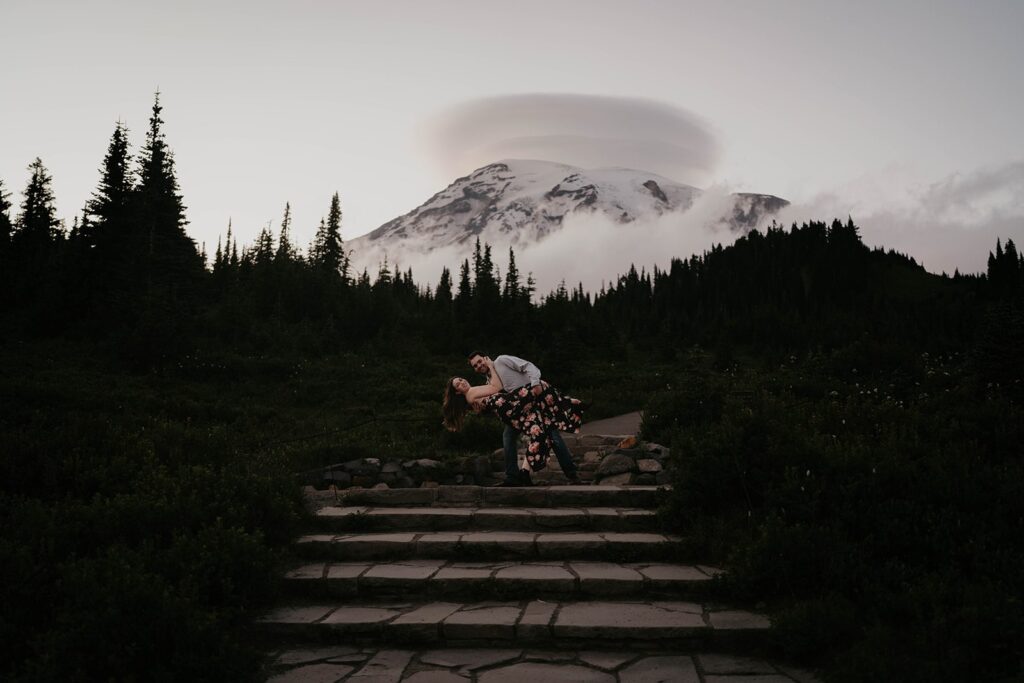 Couple dancing on the steps at Paradise during Mt Rainier engagement photos